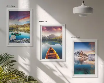 Three-piece wall art set featuring a landscape of lakes, mountains, and a boat