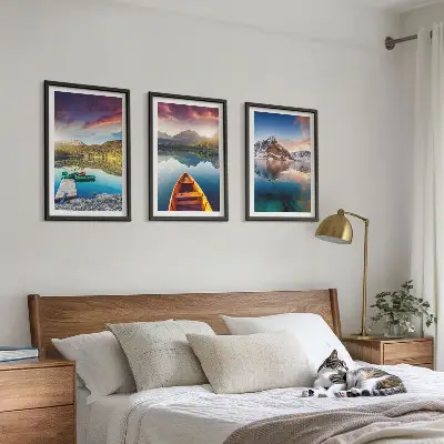 Three-piece wall art set featuring a landscape of lakes, mountains, and a boat