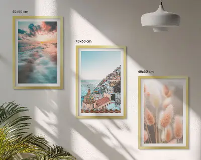 Wall art set featuring a seaside sunset with houses and flowers