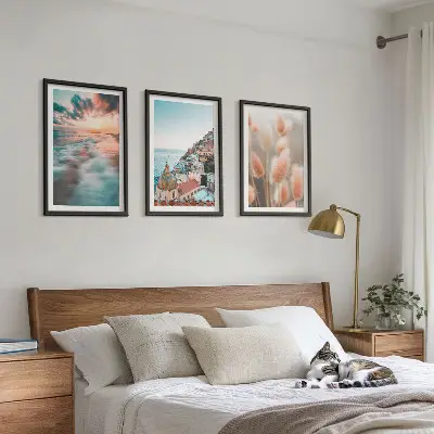 Wall art set featuring a seaside sunset with houses and flowers