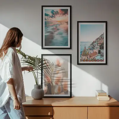 Wall art set featuring a seaside sunset with houses and flowers