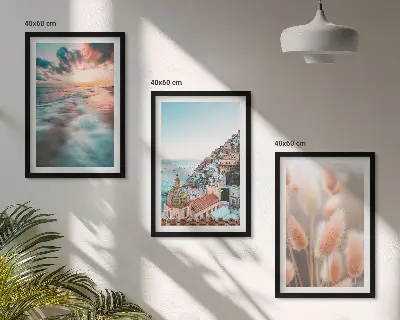 Wall art set featuring a seaside sunset with houses and flowers