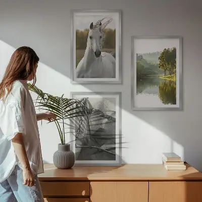 Set of 3 framed wall art pieces featuring white horses by the river in nature