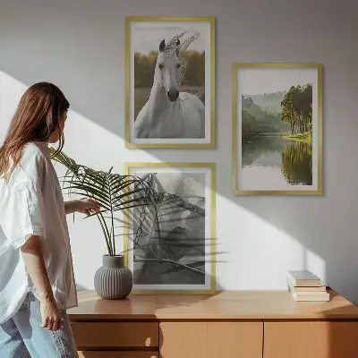 Set of 3 framed wall art pieces featuring white horses by the river in nature