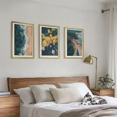 Three-piece wall art set featuring a seaside landscape with lemons and mountains