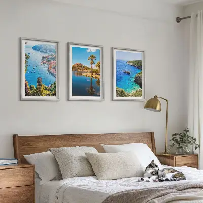 Three-piece seaside palm trees wall art with blue water view