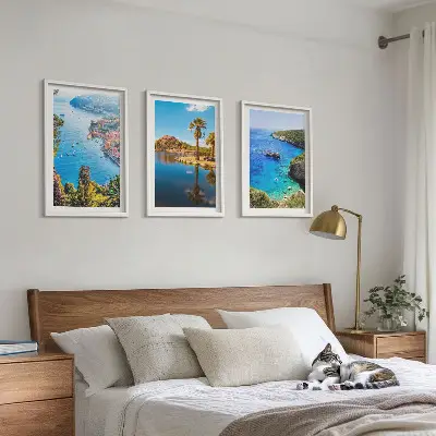 Three-piece seaside palm trees wall art with blue water view
