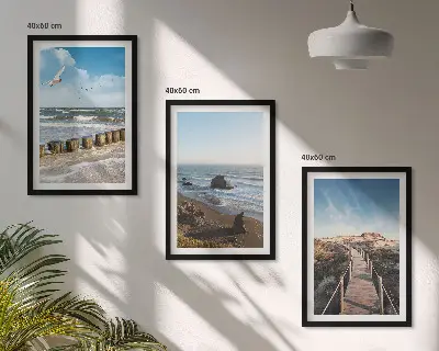 Set of 3 framed wall art pieces featuring a beach with waves, sky, and a pier walk