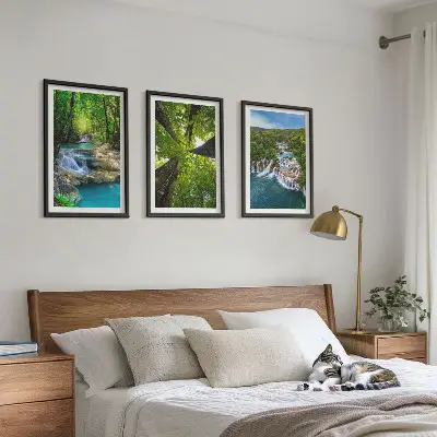 Wall art set waterfalls in a green forest