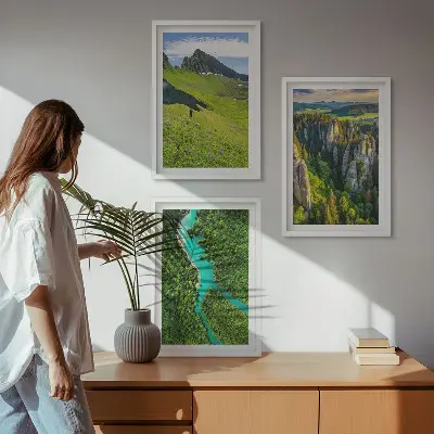 Three-piece wall art set featuring green mountains and river rocks