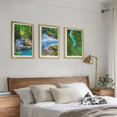 Set of 3 framed wall art pieces featuring green forests and crystalline waters