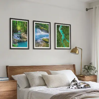 Set of 3 framed wall art pieces featuring green forests and crystalline waters
