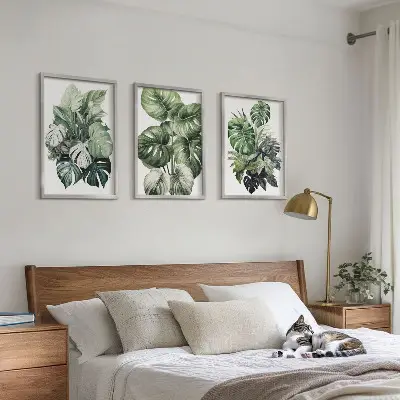 Three-piece wall art set green tropical leaves watercolor design