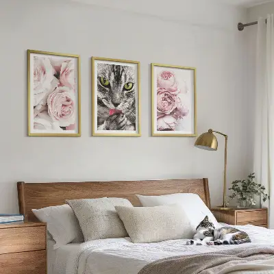 Set of 3 framed wall art pieces featuring a cat in pink flowers