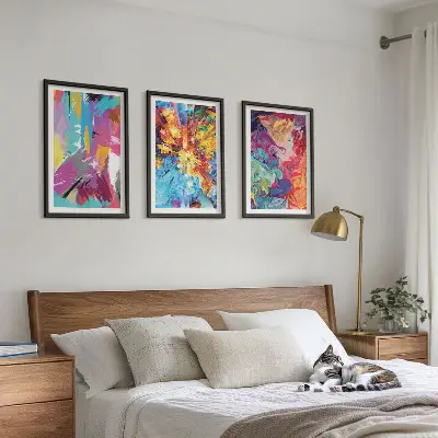 Three-piece abstract wall art set with colorful paint patterns