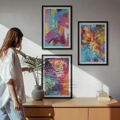 Three-piece abstract wall art set with colorful paint patterns