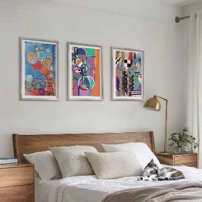 Set of 3 framed wall art pieces featuring colorful abstract geometric circles