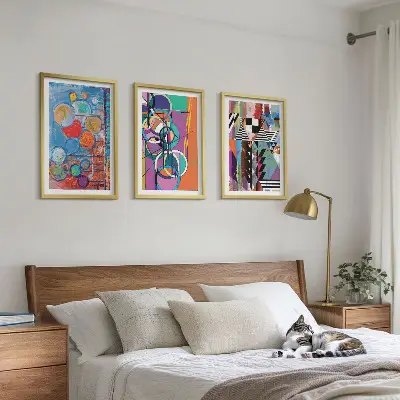 Set of 3 framed wall art pieces featuring colorful abstract geometric circles