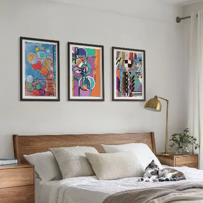 Set of 3 framed wall art pieces featuring colorful abstract geometric circles