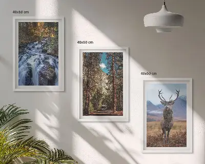 Three-piece wall art set featuring a waterfall in a mountain forest with deer and nature scenery