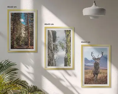Set of 3 framed wall art pieces featuring a road through a forest with mountains and a deer
