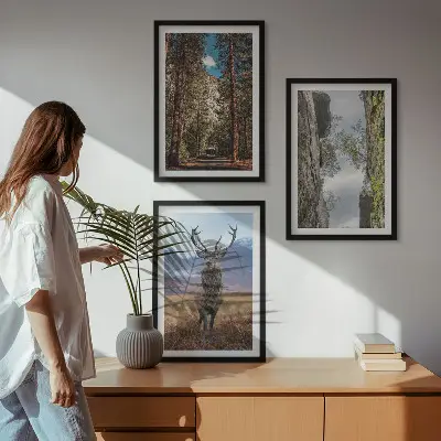 Set of 3 framed wall art pieces featuring a road through a forest with mountains and a deer
