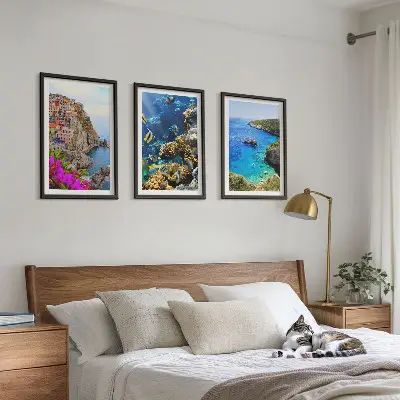 Set of 3 framed wall art pieces seaside views with colorful houses
