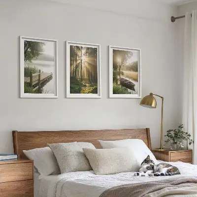 Set of 3 framed wall art pieces featuring a lake, forest, boat, and morning fog