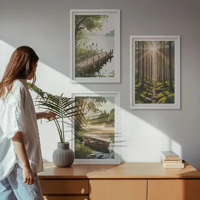 Wall art set featuring a landscape of a forest, lake, and boat