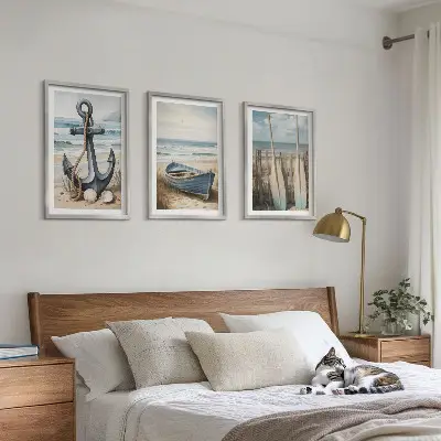 Three-piece beach-themed wall art set featuring anchor and boat oars