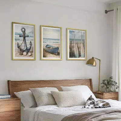 Three-piece beach-themed wall art set featuring anchor and boat oars