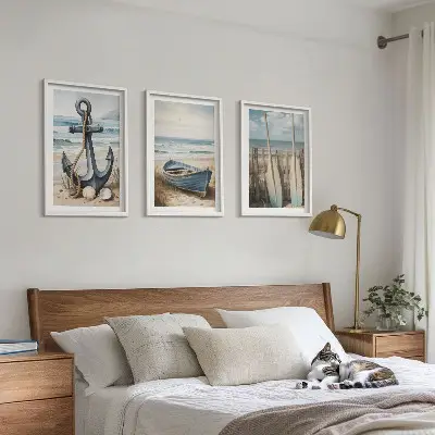 Three-piece beach-themed wall art set featuring anchor and boat oars