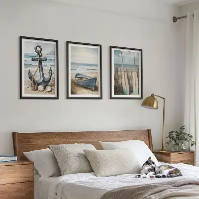 Three-piece beach-themed wall art set featuring anchor and boat oars