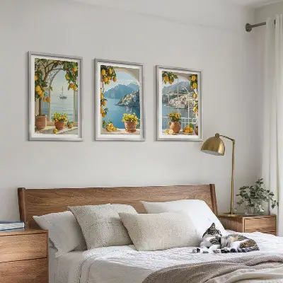 Set of 3 framed wall art pieces featuring sea town with lemons and flowers