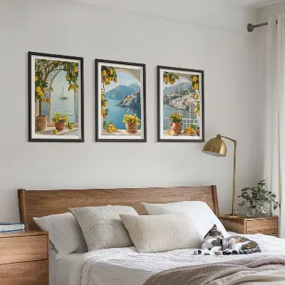 Set of 3 framed wall art pieces featuring sea town with lemons and flowers