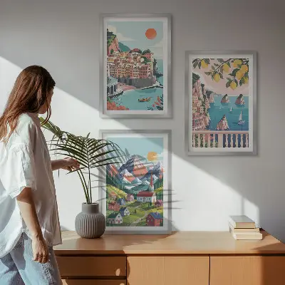 Set of 3 framed wall art pieces with colorful mountains and cities