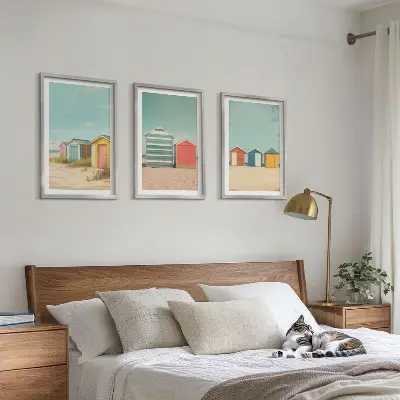 Three-piece wall art set colorful beach houses with a sunny sky
