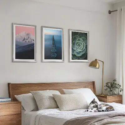 Three-piece wall art set featuring a mountain landscape with a pink sky and succulent plants