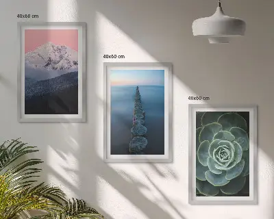 Three-piece wall art set featuring a mountain landscape with a pink sky and succulent plants