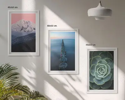 Three-piece wall art set featuring a mountain landscape with a pink sky and succulent plants