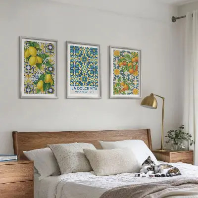 Set of 3 framed wall art prints featuring lemons, oranges, and flowers in an Italian style