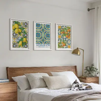 Set of 3 framed wall art prints featuring lemons, oranges, and flowers in an Italian style