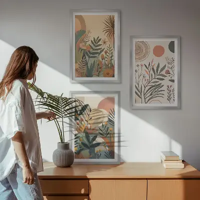 Three-piece wall art set with plant motifs in subdued colors