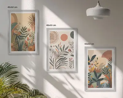 Three-piece wall art set with plant motifs in subdued colors