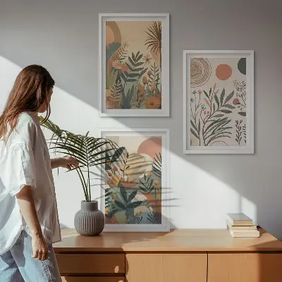 Three-piece wall art set with plant motifs in subdued colors