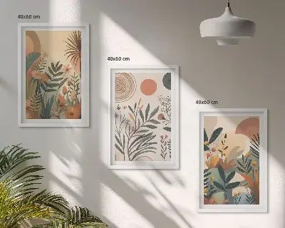Three-piece wall art set with plant motifs in subdued colors