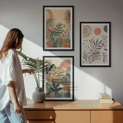 Three-piece wall art set with plant motifs in subdued colors