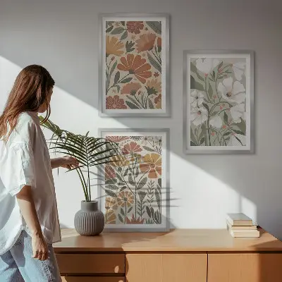 Three-piece wall art set with floral patterns in orange and green