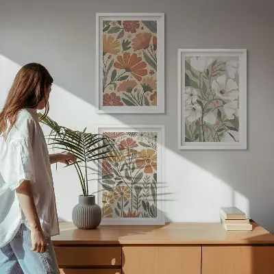 Three-piece wall art set with floral patterns in orange and green