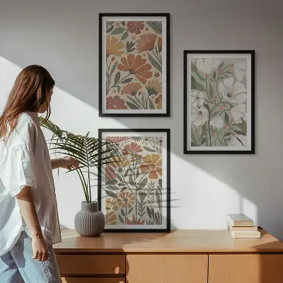 Three-piece wall art set with floral patterns in orange and green